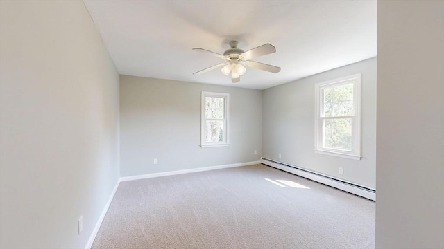 12 Prouty Ln, Rutland, MA 01543 - unfurnished room featuring a baseboard heating unit, a ceiling fan, baseboards, and carpet floors