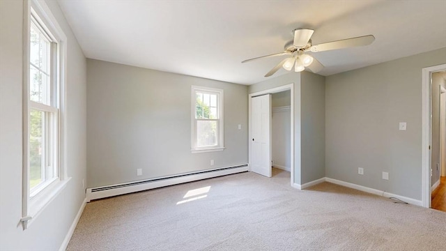 12 Prouty Ln, Rutland, MA 01543 - unfurnished bedroom with a baseboard radiator, carpet, a closet, and baseboards