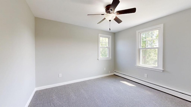 12 Prouty Ln, Rutland, MA 01543 - carpeted spare room with baseboard heating, plenty of natural light, ceiling fan, and baseboards