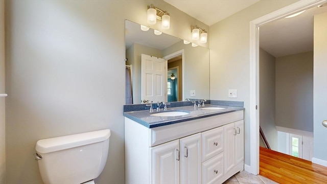12 Prouty Ln, Rutland, MA 01543 - full bathroom featuring toilet, double vanity, and tile patterned floors