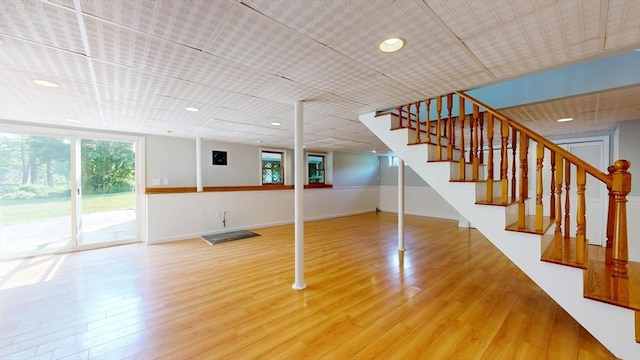 12 Prouty Ln, Rutland, MA 01543 - below grade area with stairs, wood finished floors, recessed lighting, and baseboards