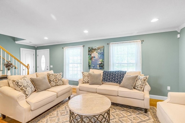 169 Braeburn Rd, East Longmeadow, MA 01128 - living room with ornamental molding, stairway, recessed lighting, light wood-type flooring, and baseboards