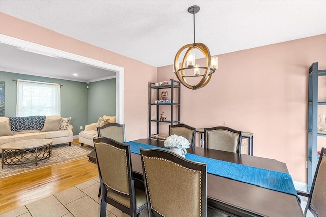 169 Braeburn Rd, East Longmeadow, MA 01128 - dining area with a chandelier and baseboards