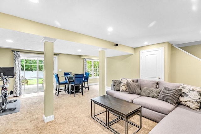 169 Braeburn Rd, East Longmeadow, MA 01128 - living area with light colored carpet, recessed lighting, decorative columns, and baseboards