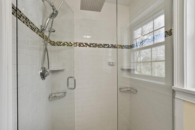 bathroom with a shower stall