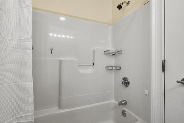 bathroom with shower / bath combination