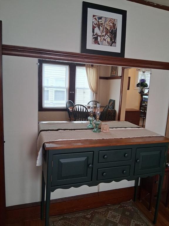49-51 Sterling St, Somerville, MA 02144 - dining area featuring baseboards
