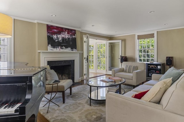 14 Meigh Rd, Newton, MA 02467 - living area featuring a fireplace with flush hearth, crown molding, recessed lighting, and wood finished floors