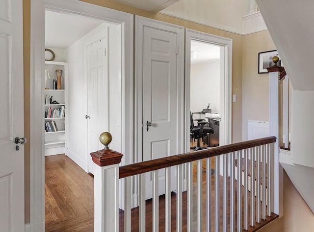 14 Meigh Rd, Newton, MA 02467 - hall featuring a desk, wood finished floors, an upstairs landing, and built in shelves