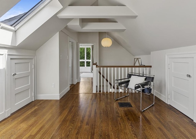 14 Meigh Rd, Newton, MA 02467 - bonus room featuring wood finished floors, baseboards, a skylight, and lofted ceiling