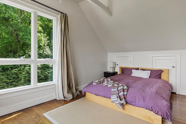 14 Meigh Rd, Newton, MA 02467 - bedroom with wood finished floors, vaulted ceiling, and baseboards