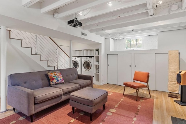 14 Meigh Rd, Newton, MA 02467 - living room featuring washer and dryer, hardwood / wood-style floors, beamed ceiling, and stairway