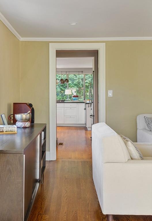 14 Meigh Rd, Newton, MA 02467 - hall featuring dark wood-style floors and ornamental molding