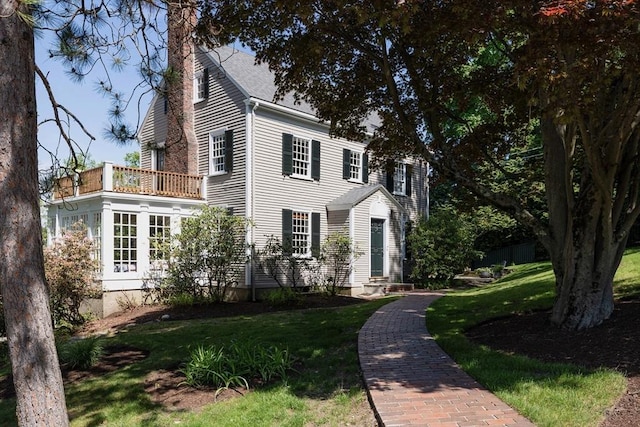 14 Meigh Rd, Newton, MA 02467 - view of front of home featuring a balcony and a front lawn