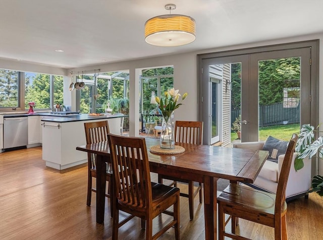 14 Meigh Rd, Newton, MA 02467 - dining space with light wood-type flooring, french doors, and recessed lighting