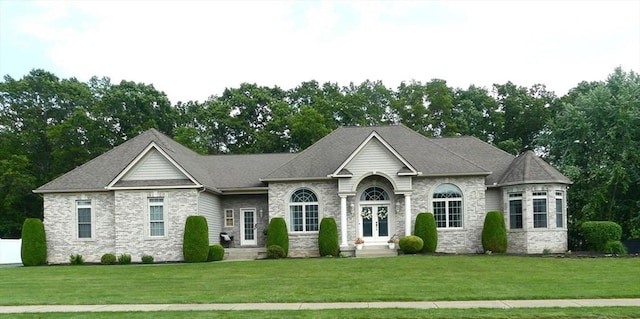 99 Elizabeth St, Agawam, MA 01030 - french provincial home featuring a front lawn and stone siding