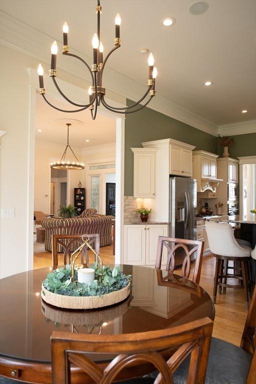 99 Elizabeth St, Agawam, MA 01030 - dining room featuring ornamental molding, a chandelier, light wood-style floors, and recessed lighting