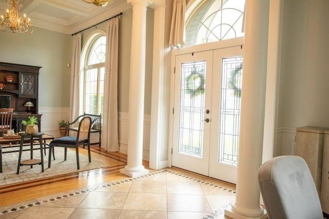 99 Elizabeth St, Agawam, MA 01030 - doorway with decorative columns, french doors, a chandelier, ornamental molding, and coffered ceiling