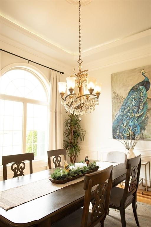 99 Elizabeth St, Agawam, MA 01030 - dining space with a chandelier and a tray ceiling