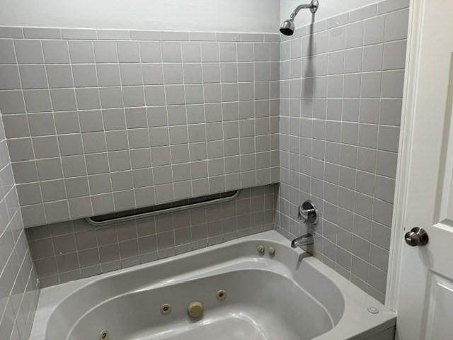 bathroom with vanity, wood-type flooring, a baseboard radiator, and a wealth of natural light