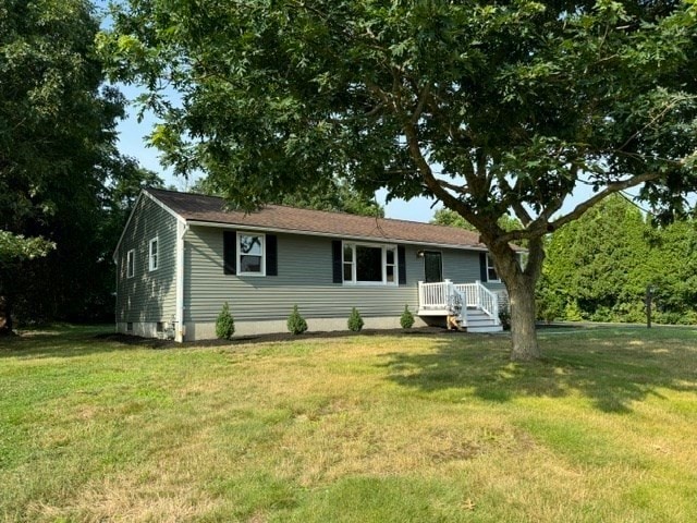 view of front of house featuring a front yard