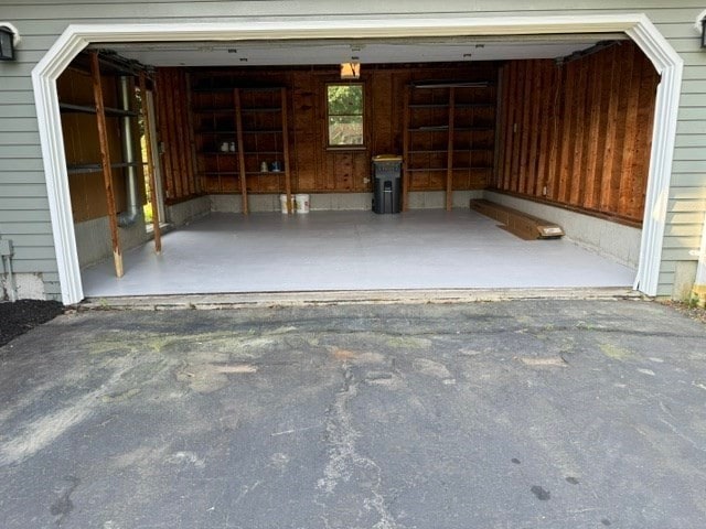 garage with wood walls