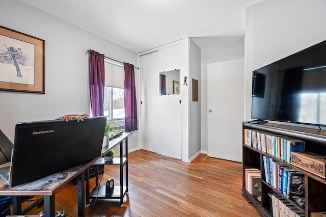 office area with wood-type flooring