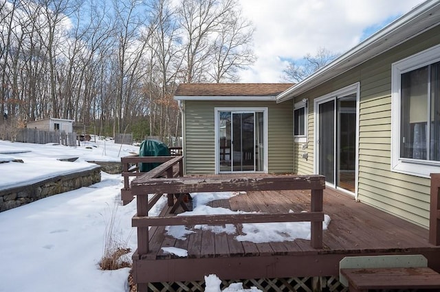 view of snow covered deck