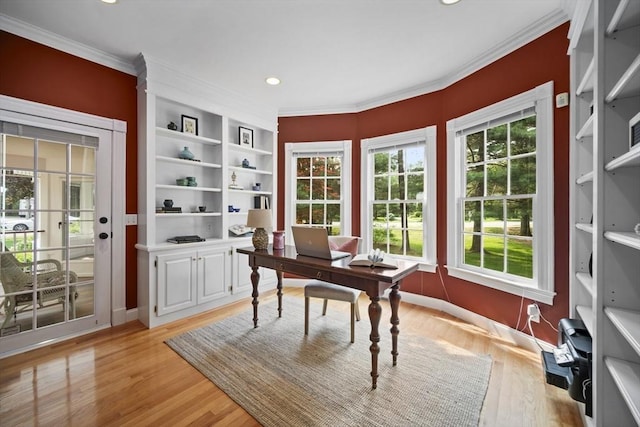 32 Bulkley Rd, Sudbury, MA 01776 - office with light wood finished floors, crown molding, built in shelves, recessed lighting, and baseboards