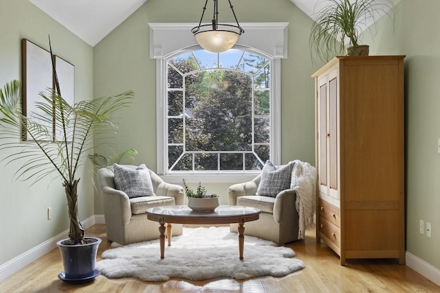32 Bulkley Rd, Sudbury, MA 01776 - living area with vaulted ceiling, light wood-type flooring, and baseboards