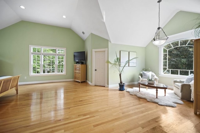 32 Bulkley Rd, Sudbury, MA 01776 - living room with lofted ceiling, light wood-style flooring, baseboards, and recessed lighting