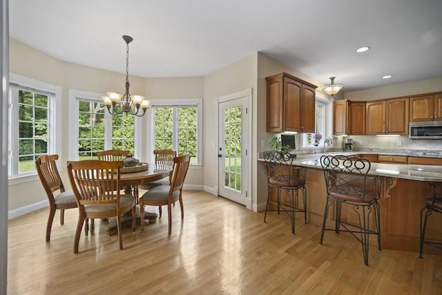 32 Bulkley Rd, Sudbury, MA 01776 - dining space featuring baseboards, light wood-style flooring, a chandelier, and recessed lighting