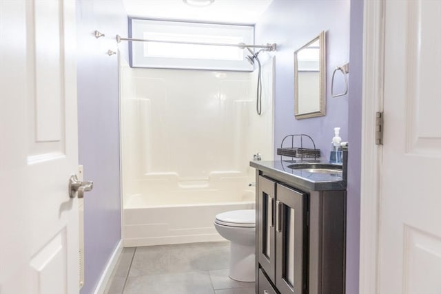 bathroom with vanity, shower / bathtub combination, toilet, baseboards, and tile patterned floors