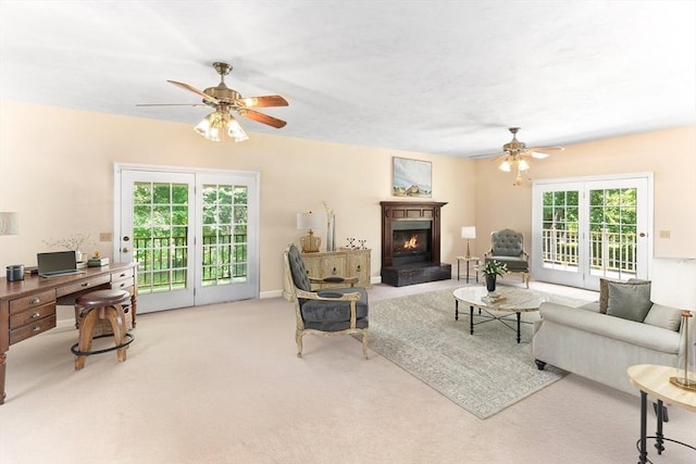 31 Swing Dr, Berkley, MA 02779 - living room featuring a ceiling fan, carpet flooring, a warm lit fireplace, and an office area
