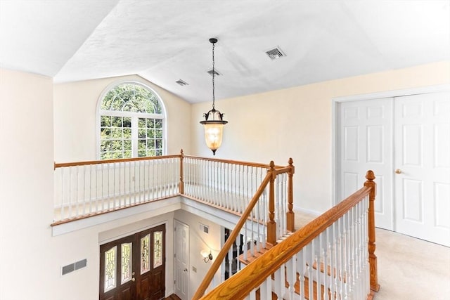 31 Swing Dr, Berkley, MA 02779 - staircase with vaulted ceiling and carpet floors