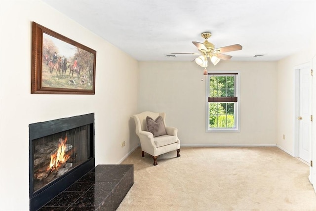 31 Swing Dr, Berkley, MA 02779 - sitting room featuring ceiling fan, a warm lit fireplace, and carpet flooring