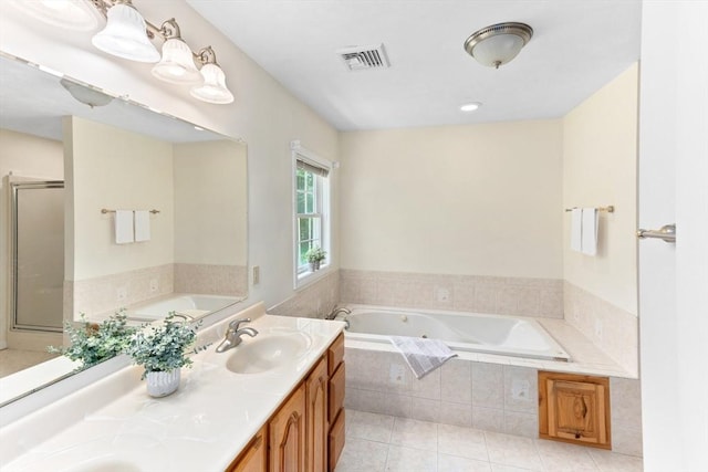 31 Swing Dr, Berkley, MA 02779 - bathroom featuring a tub with jets, double vanity, tile patterned floors, and a shower stall