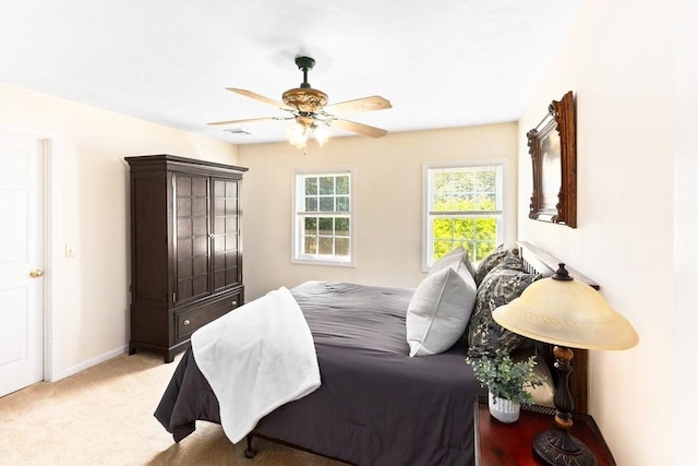 31 Swing Dr, Berkley, MA 02779 - bedroom with light carpet and a ceiling fan