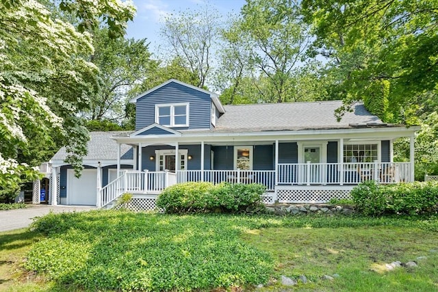 8 Winthrop Ave, Bedford, MA 01730 - view of front of house with a porch, a garage, a front lawn, and driveway