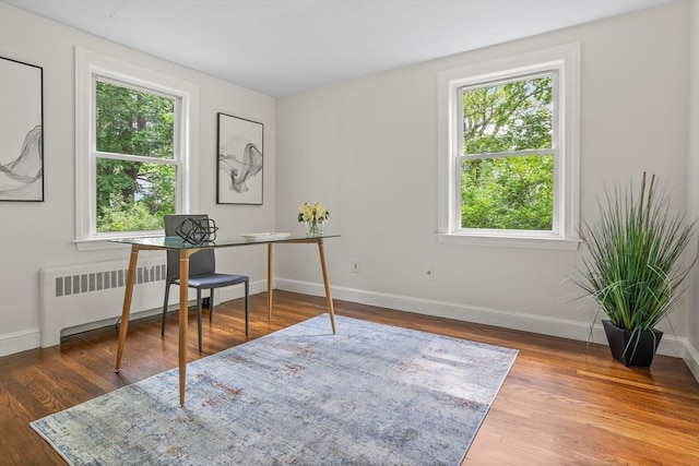 8 Winthrop Ave, Bedford, MA 01730 - office space with radiator heating unit, plenty of natural light, and wood finished floors