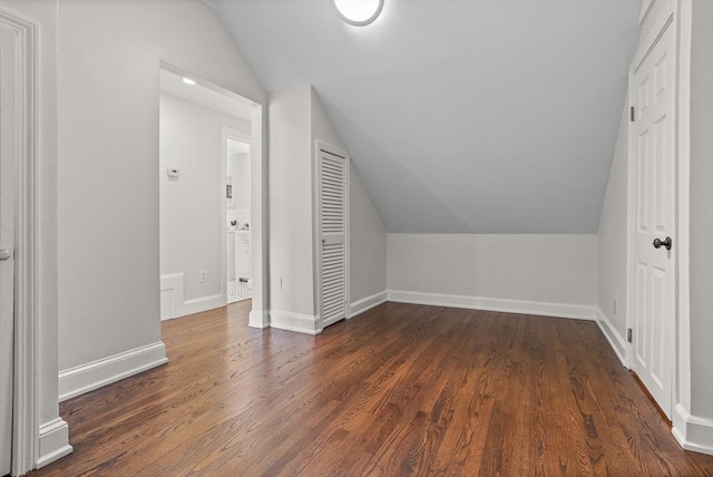 8 Winthrop Ave, Bedford, MA 01730 - additional living space with lofted ceiling and dark wood finished floors