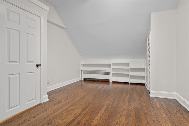 8 Winthrop Ave, Bedford, MA 01730 - additional living space featuring radiator, dark wood-style flooring, and vaulted ceiling