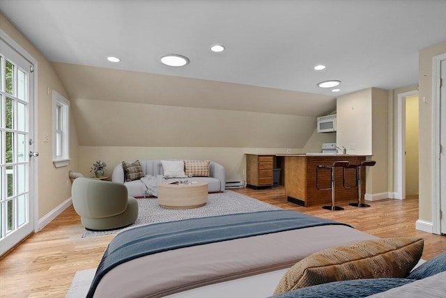 8 Winthrop Ave, Bedford, MA 01730 - bedroom featuring lofted ceiling, light wood-style flooring, recessed lighting, and a baseboard heating unit