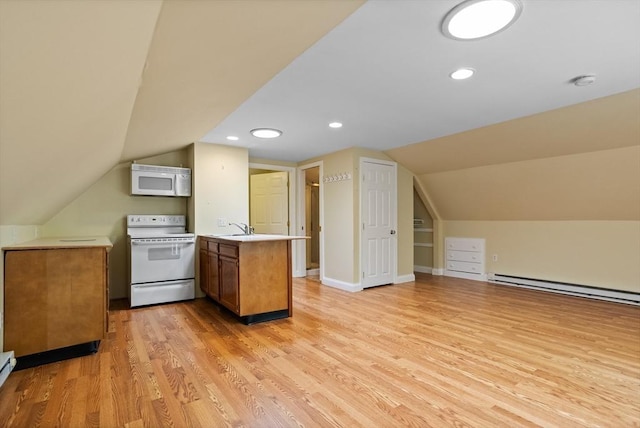 8 Winthrop Ave, Bedford, MA 01730 - kitchen with white appliances, a peninsula, brown cabinetry, lofted ceiling, and light wood finished floors