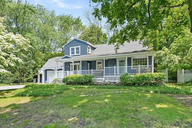 8 Winthrop Ave, Bedford, MA 01730 - view of front of home with covered porch, a front lawn, and an attached garage