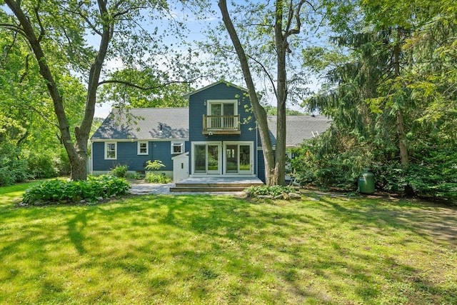 8 Winthrop Ave, Bedford, MA 01730 - rear view of property featuring a balcony and a yard