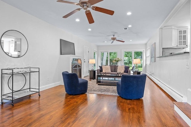 8 Winthrop Ave, Bedford, MA 01730 - living room featuring a baseboard heating unit, recessed lighting, wood finished floors, and ceiling fan