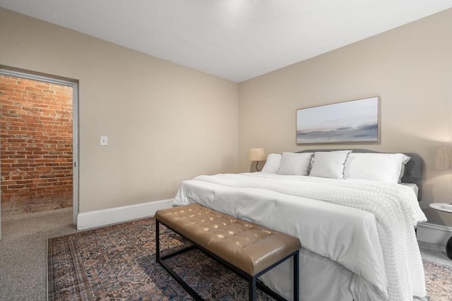 48 Kent St Unit 1, Brookline, MA 02445 - bedroom featuring carpet flooring, brick wall, and baseboards