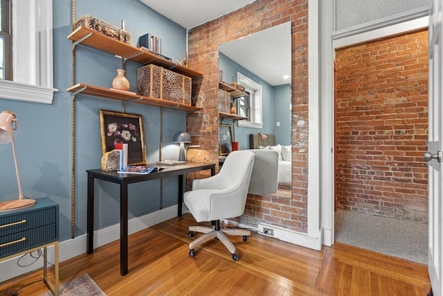 48 Kent St Unit 1, Brookline, MA 02445 - home office with wood finished floors and brick wall