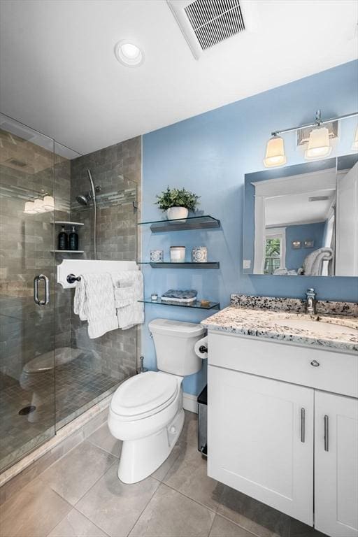100 Burrill St Unit 3, Swampscott, MA 01907 - full bathroom featuring toilet, tile patterned floors, vanity, and a stall shower